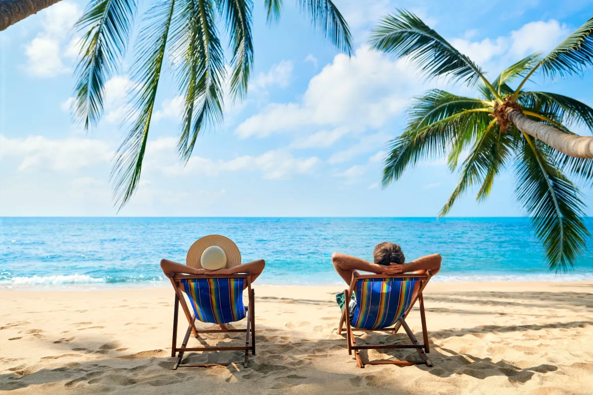 Two people on a tropical beach.