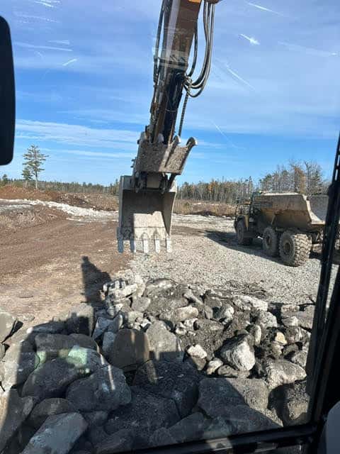 HD Construction & Development removing debris from site