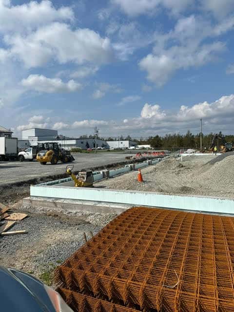 Commercial excavation with gravel and machinery by HD Construction & Development