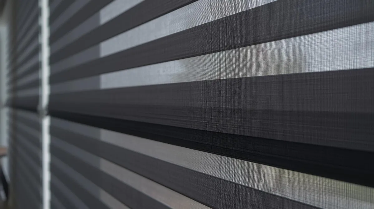 Zebra Shades in their closed/privacy position, showing solid fabric bands blocking the view.