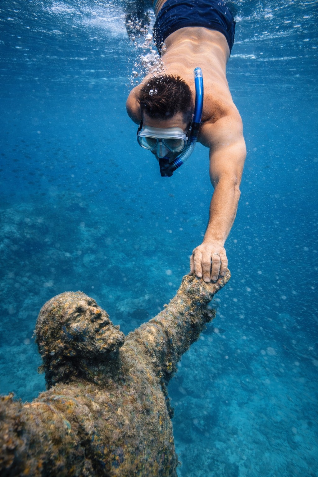 Oliver Maldonado Photographed under water with Jesus Statue