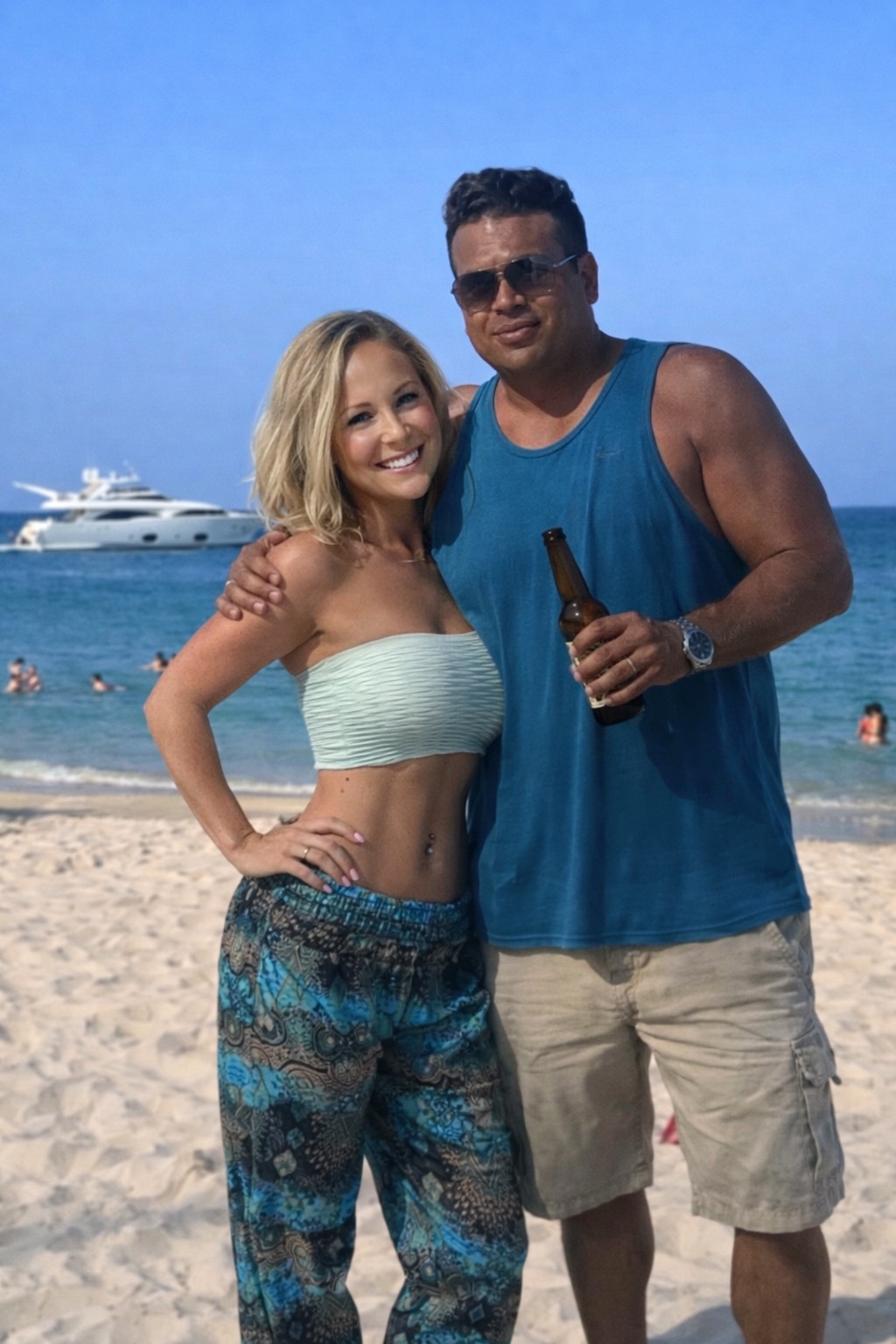Oliver Maldonado featured and seen on Beach with irlFriend with Yacht in Background