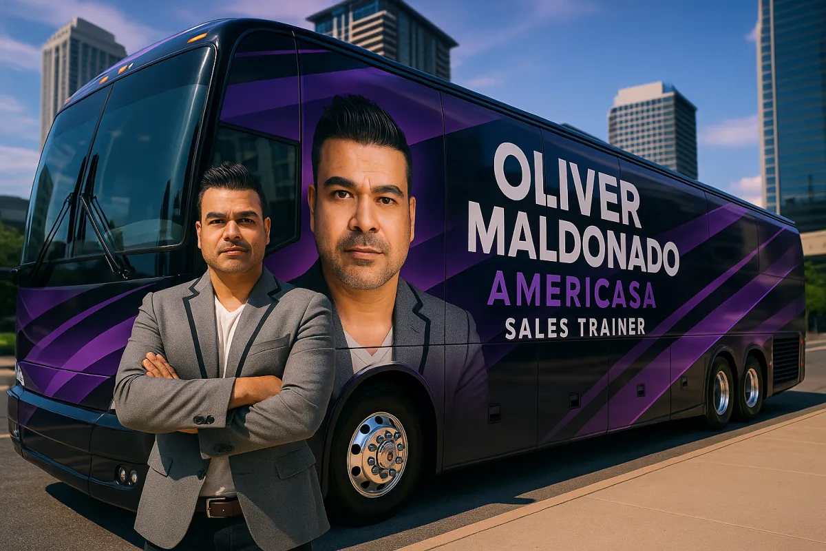 Oliver Maldonado Americas Sales Trainer pictured posing with his Tour Bus