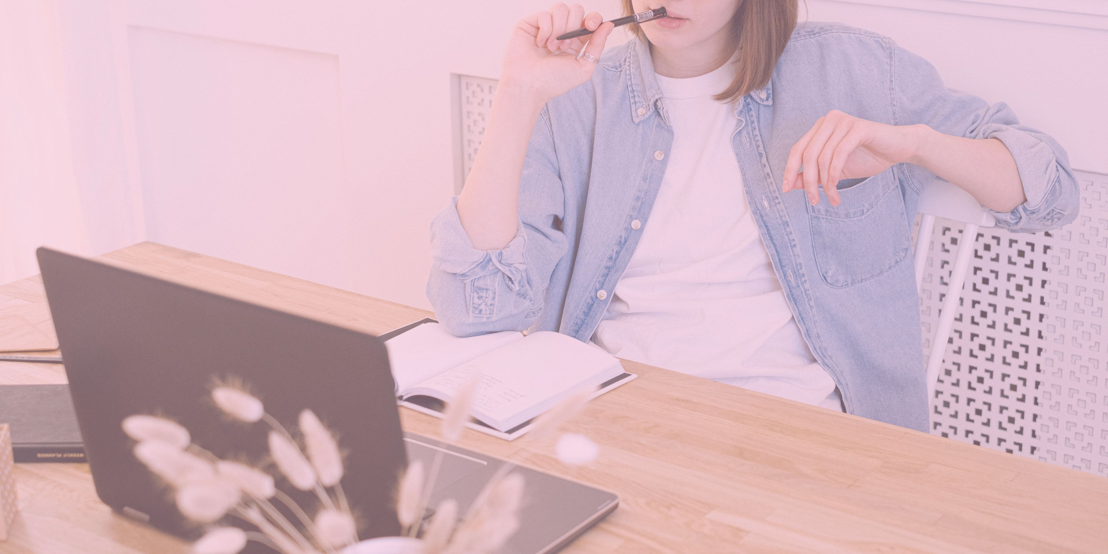 Woman sitting at laptop