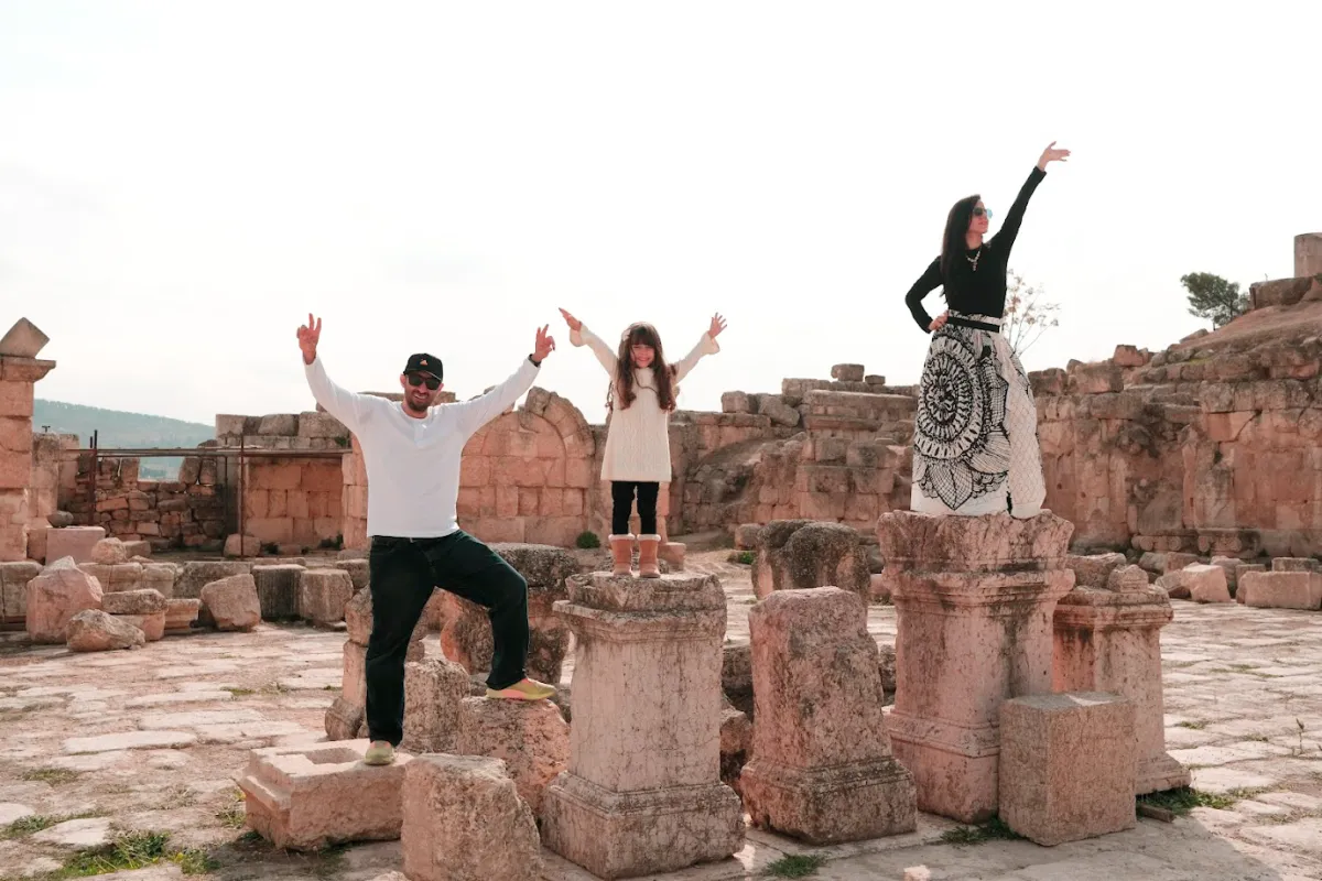 Family posing in Jerash ruins in Jordan