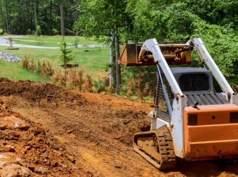 excavator being used to excavate a land in anchorage