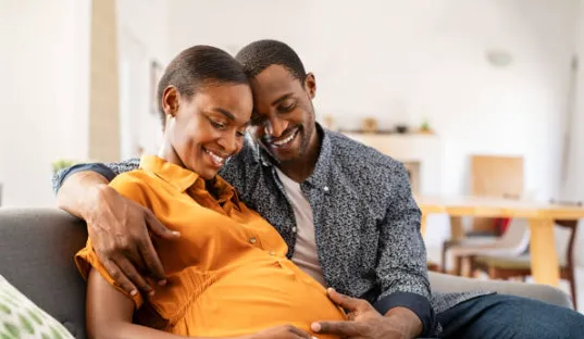 "Term life insurance concept illustrated with a family protected by an umbrella symbolizing coverage and financial security. Ideal for affordable, temporary protection."