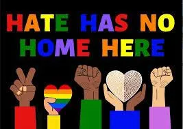 HATE HAS NO HOME HERE in rainbow colored letters