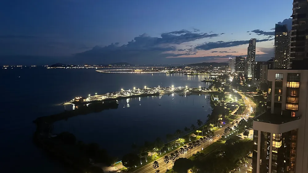 Foreign investor reviewing Panama real estate purchase documents