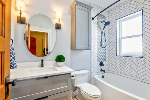 Bright, minimalist bathroom with natural light and calming decor — creating a clean and soothing environment that supports brain health and wellbeing.