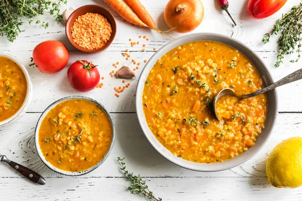 Warm lentil soup in a bowl, a nourishing winter meal rich in protein and fiber to support brain health and steady energy.