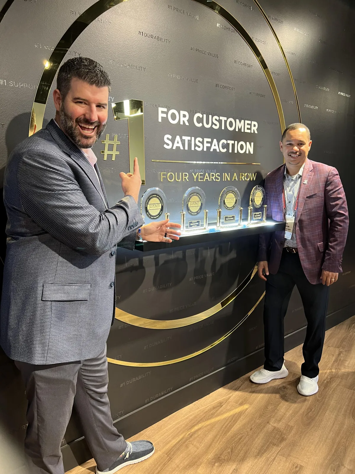 Snooze Mattress CEO Matt Smith and President George Winn visits with Tempur-Pedic at the Las Vegas World Marketin.