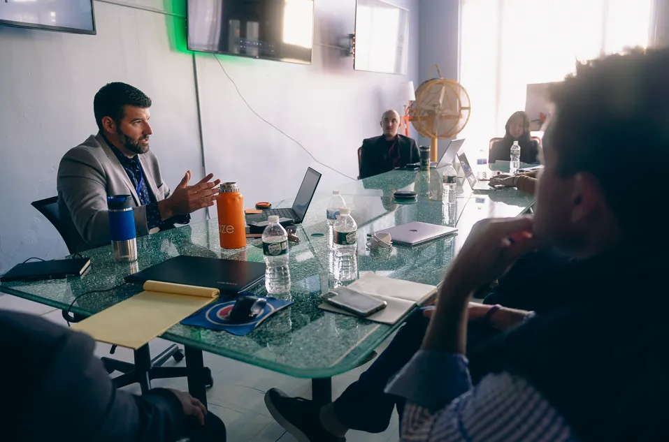 Snooze Mattress CEO meets with potential franchisees during a discovery day.