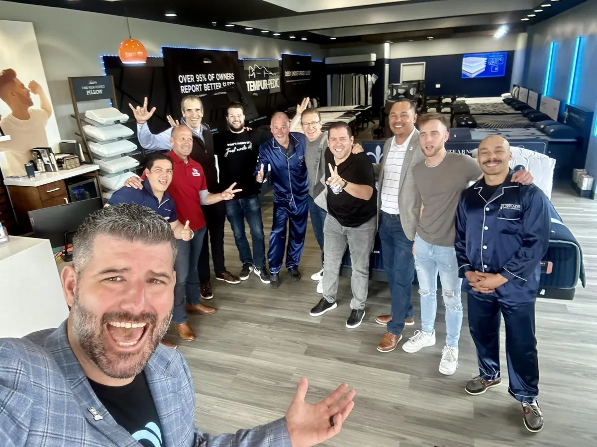 CEO Matt Smith with staff members of the Omaha, NE Snooze Mattress Co.