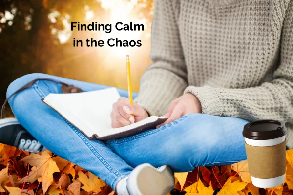 woman journaling in fall setting