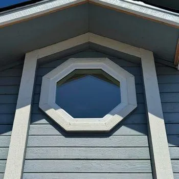 Custom octagon accent window installation on a Beaumont, CA home