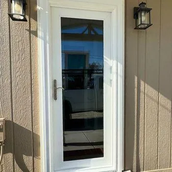 Exterior glass door installation with white frame in Perris, California