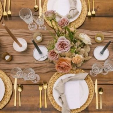 top view dinner party table with cutlery and glasses and flowers