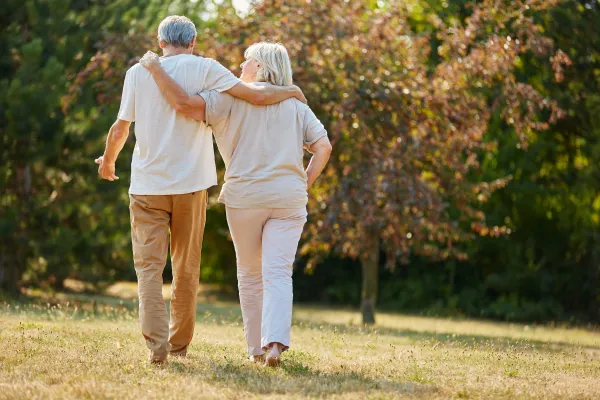 Image of a senior engaged in a meaningful activity, such as volunteering, spending time with loved ones, or pursuing a hobby.