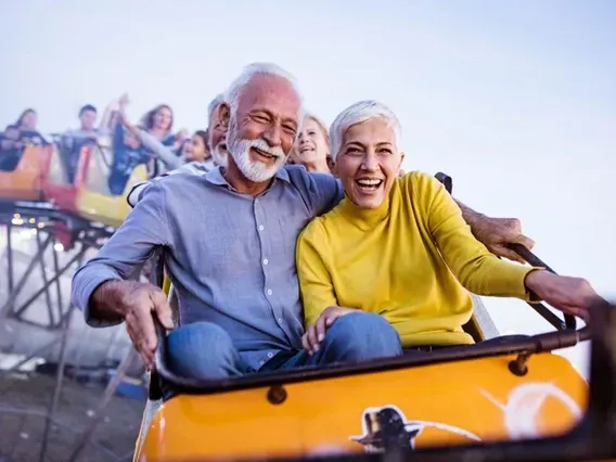 Two people on a roller coaster