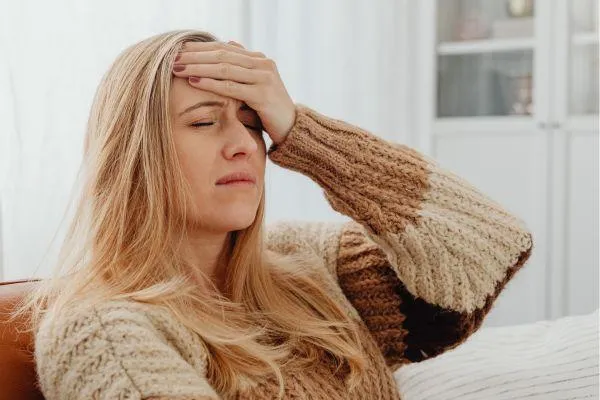 woman suffering from headaches