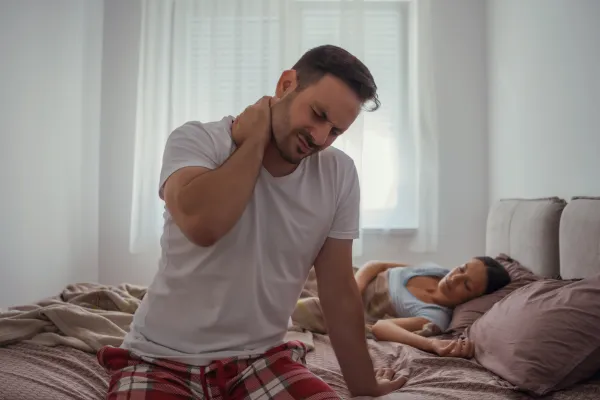 Why Does My Neck Hurt When I Wake Up? Common Causes & How to Prevent It