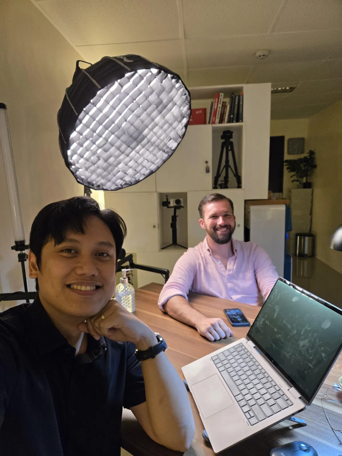 Christian entrepreneur working with Bible and laptop, symbolizing stewardship and purpose-driven business