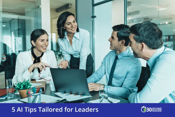Leaders-connecting-around-a-conference-table-with-a-laptop