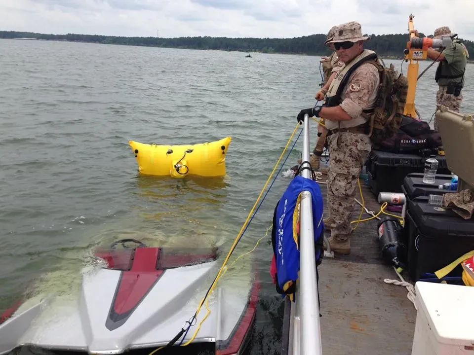 Team of TXPSD divers coordinating during a rescue dive operation