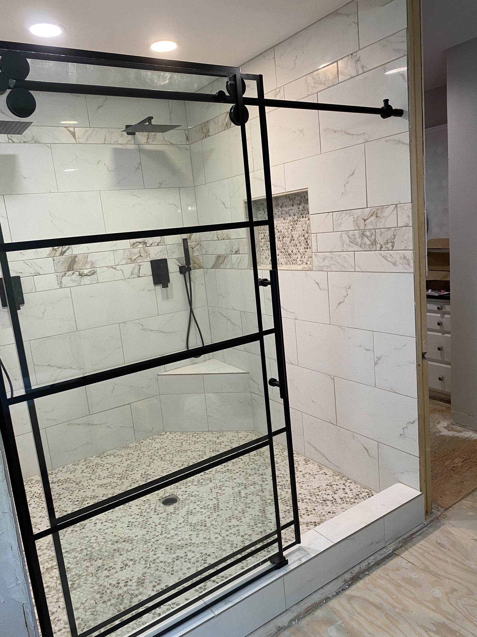 I white custom tiled bathroom remodel in Wichita, Kansas