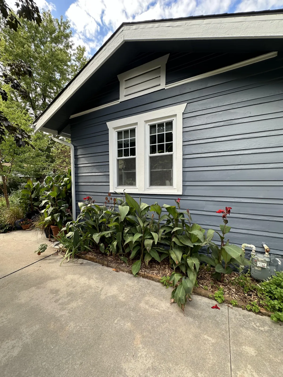 Exterior siding and paint work on a home in Wichita, Kansas