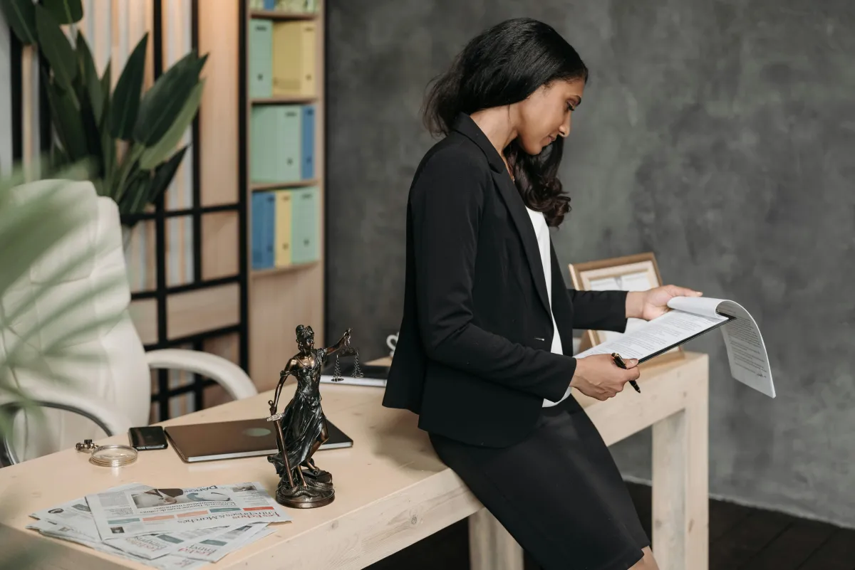 HR manager preparing for a meeting secure that her ai contract management solution is working for her