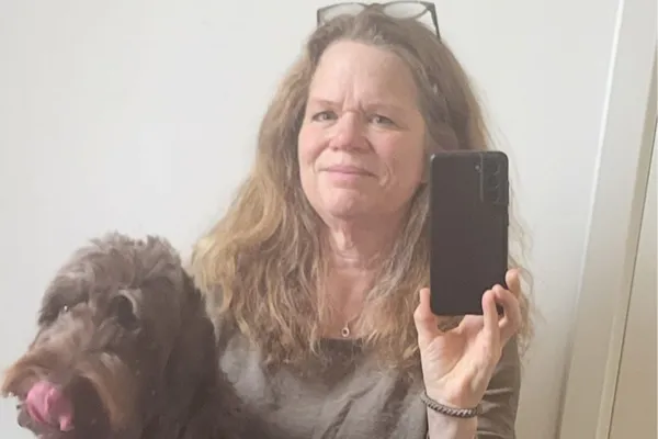 Annika taking a selfie with her dog