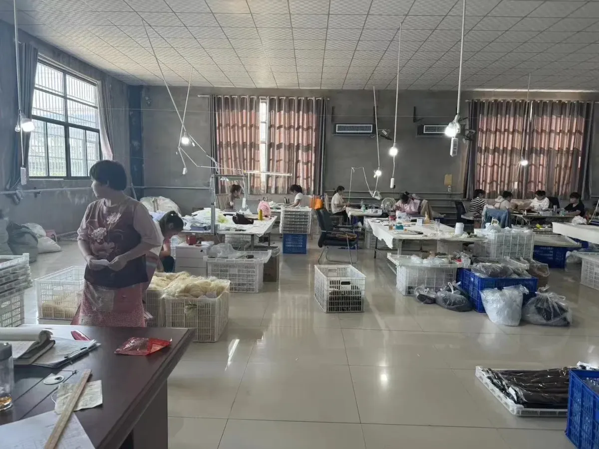 Technician sorting human hair by length and quality