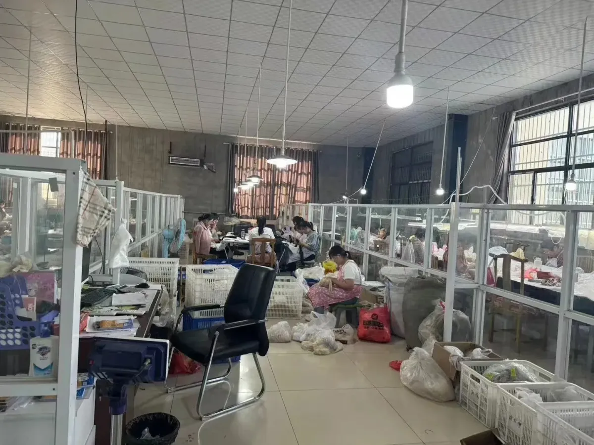 Wig-making staff working in coordinated production lines
