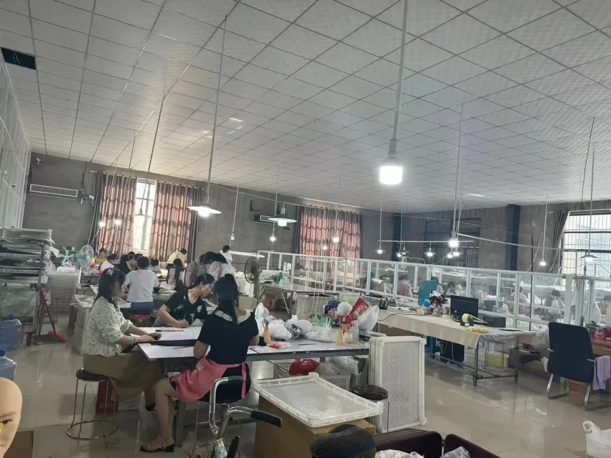 Factory layout with staff focused on hair preparation and styling