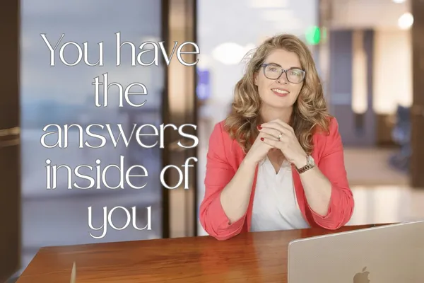 Elaine Walsh McGrath sitting at a desk