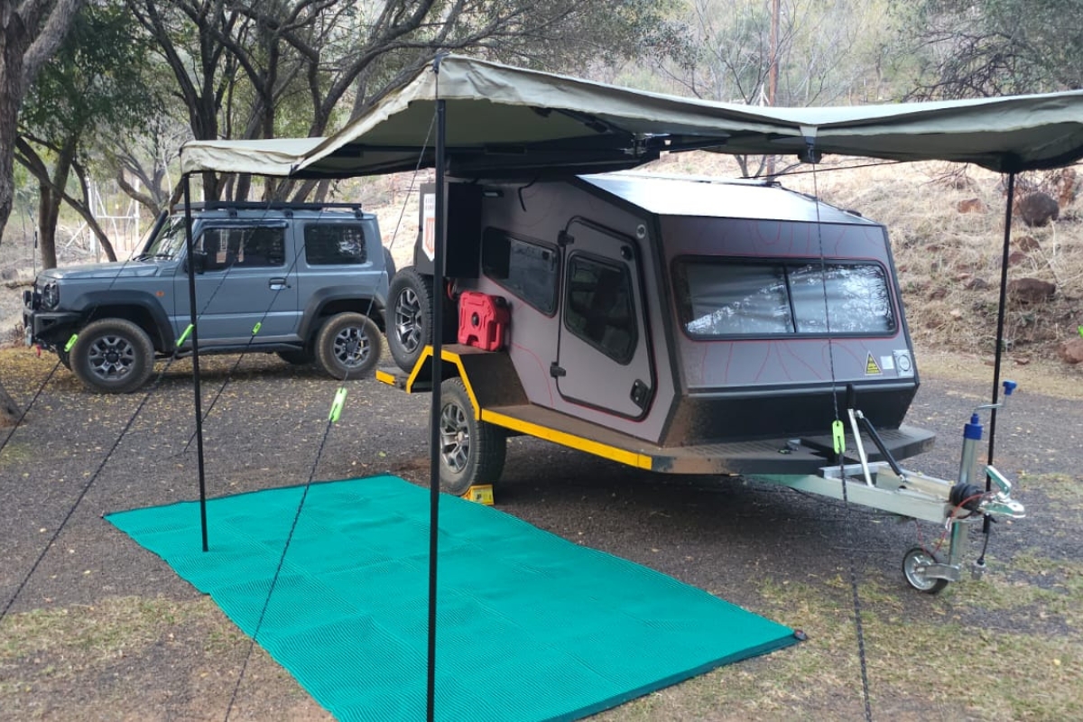 Fully set up and ready for adventure: KK3 with ground sail deployed and awning open, perfect for a weekend in the wild