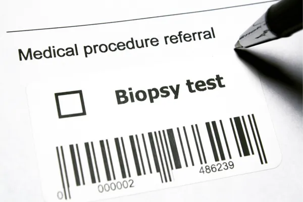 When Should You Consider Biopsying a Dark Spot Inside Your Mouth?
