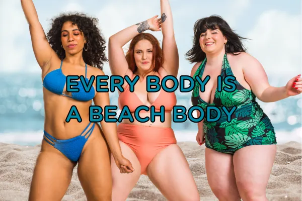 Three women of different body sizes pose joyfully in bathing suits against a beach background.