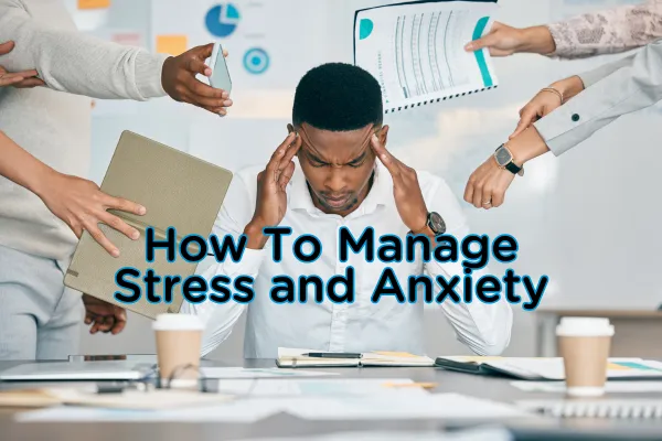 a young man sits at desk with his head in his hands his has multiple hands in the around him demanding various deadlines