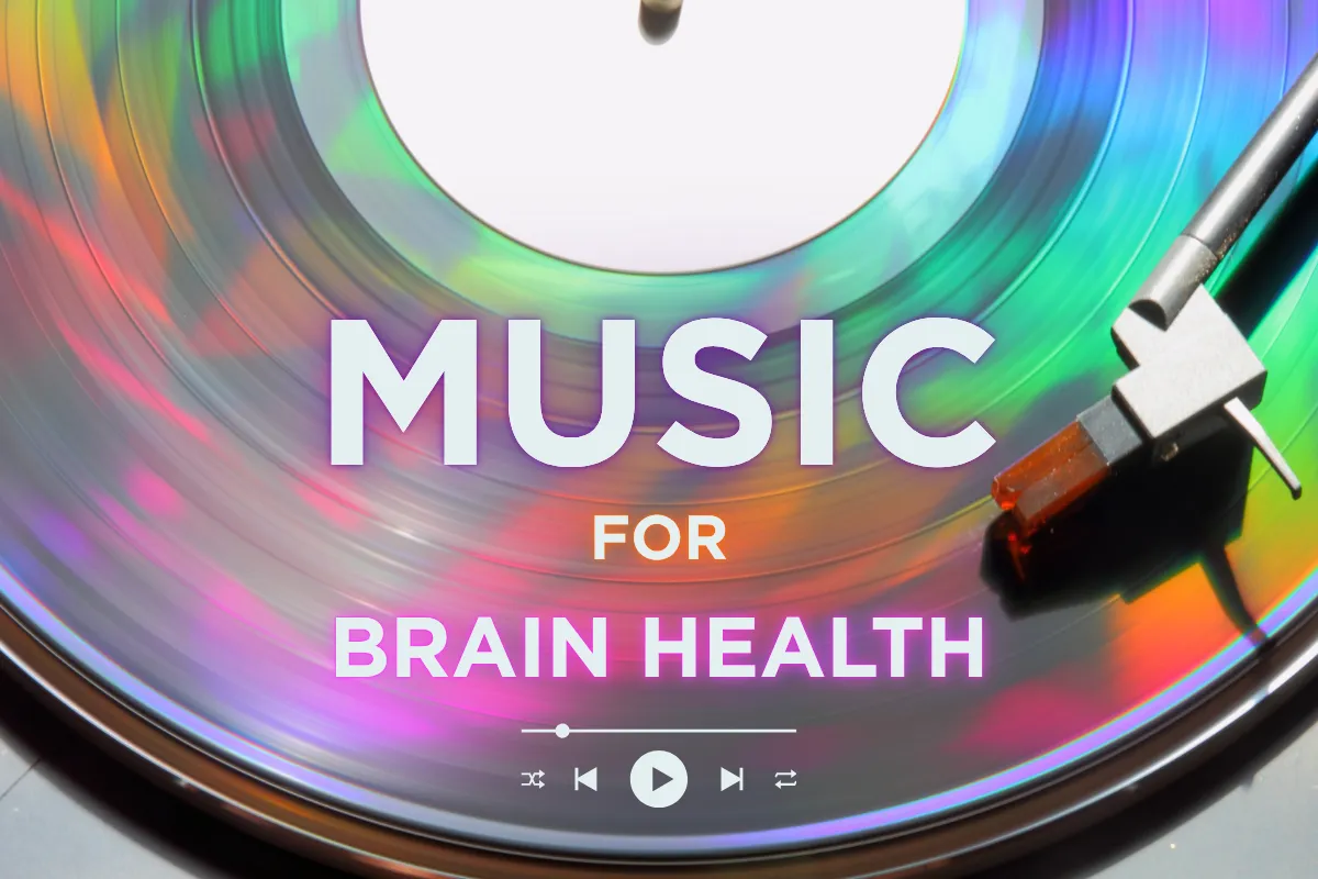 Music for brain health. A rainbow vinyl spinning on a record player.