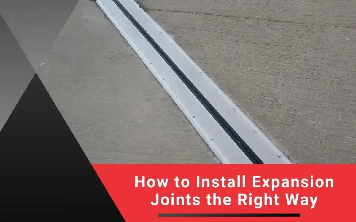 Technician installing expansion joint in fresh concrete
