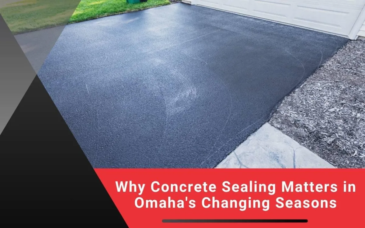 Freshly sealed concrete driveway in Omaha neighborhood