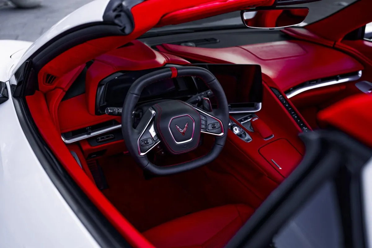 Interior view of Corvette Stingray Convertible with red leather seats and steering wheel