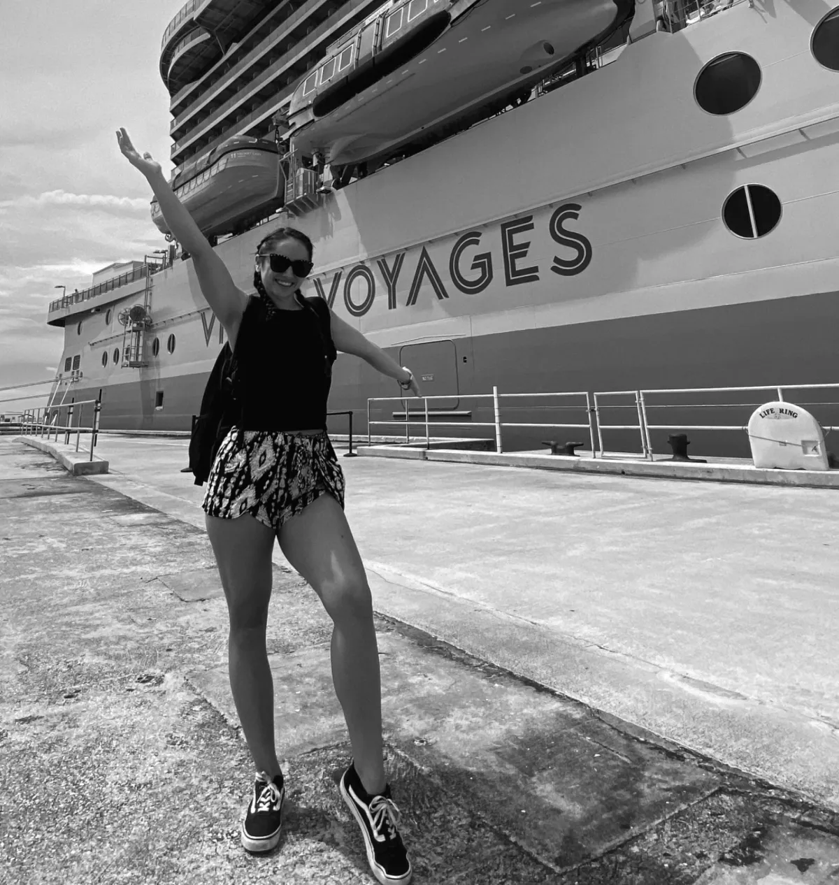celeste black and white photo in front of cruise ship