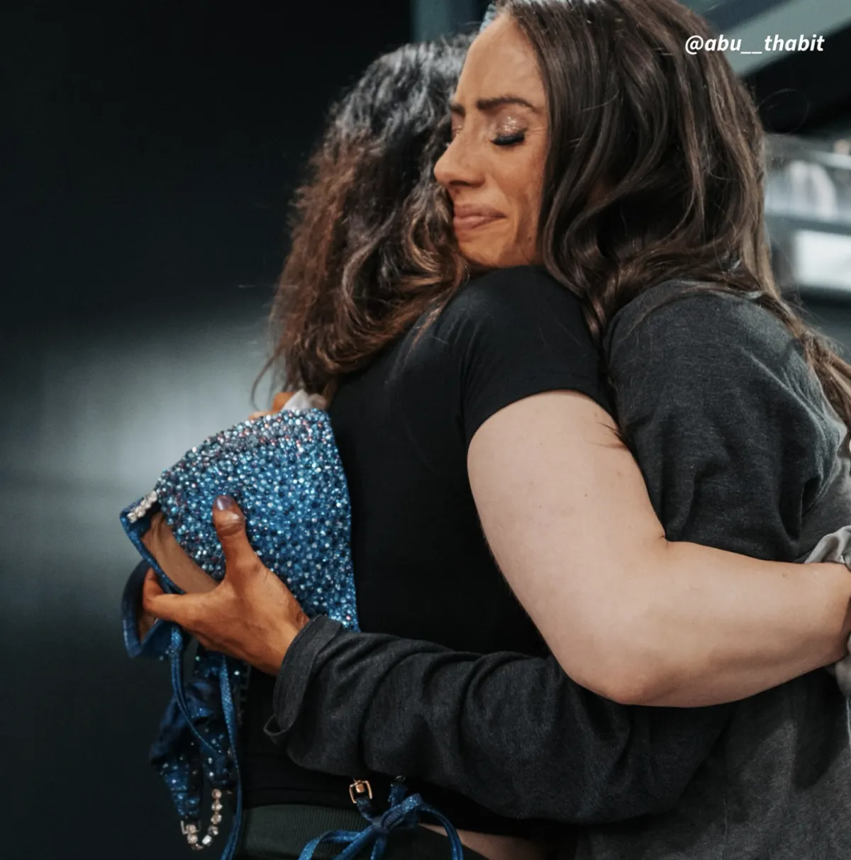celeste hugging a freind