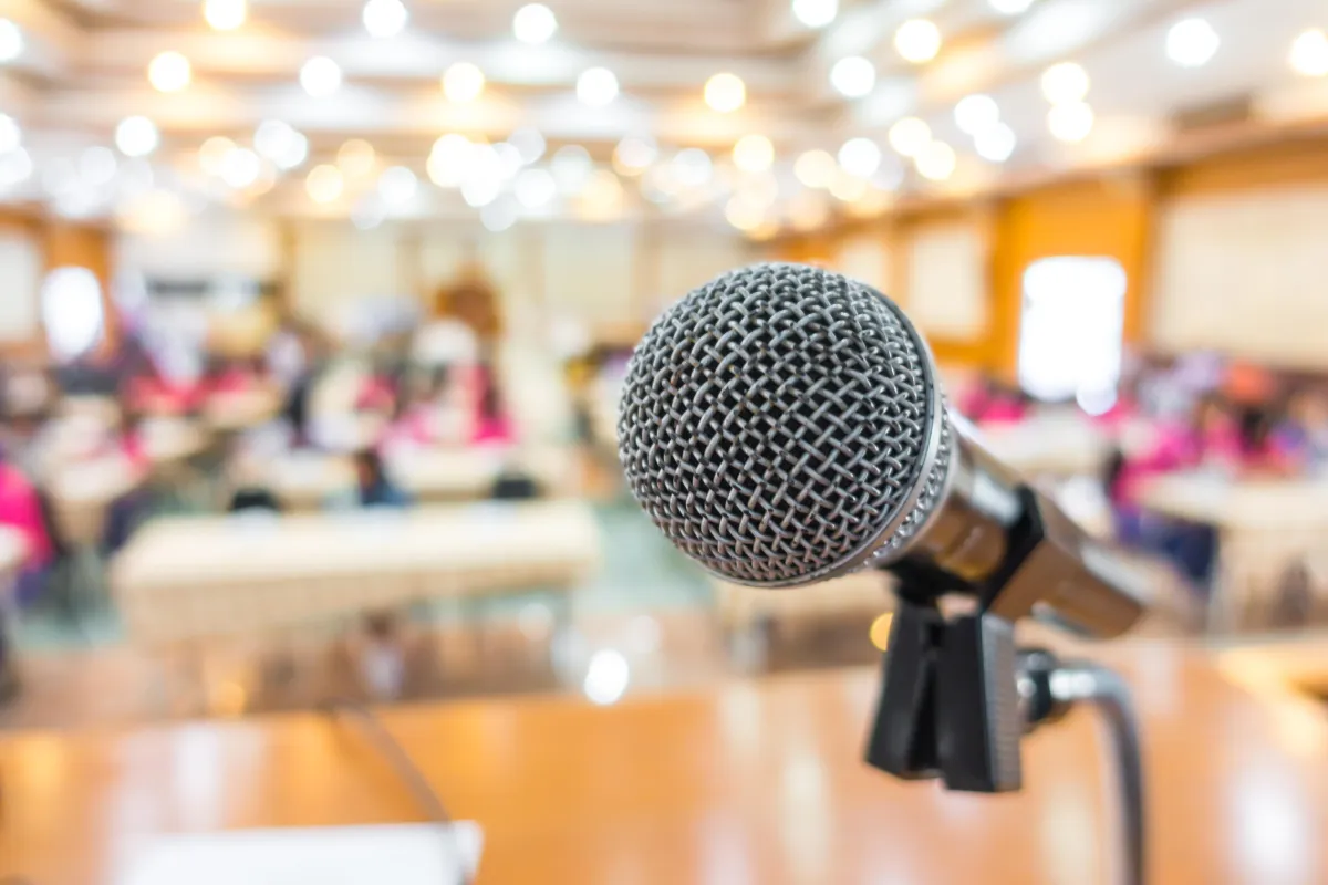 Microphone symbolizing readiness and quiet confidence.