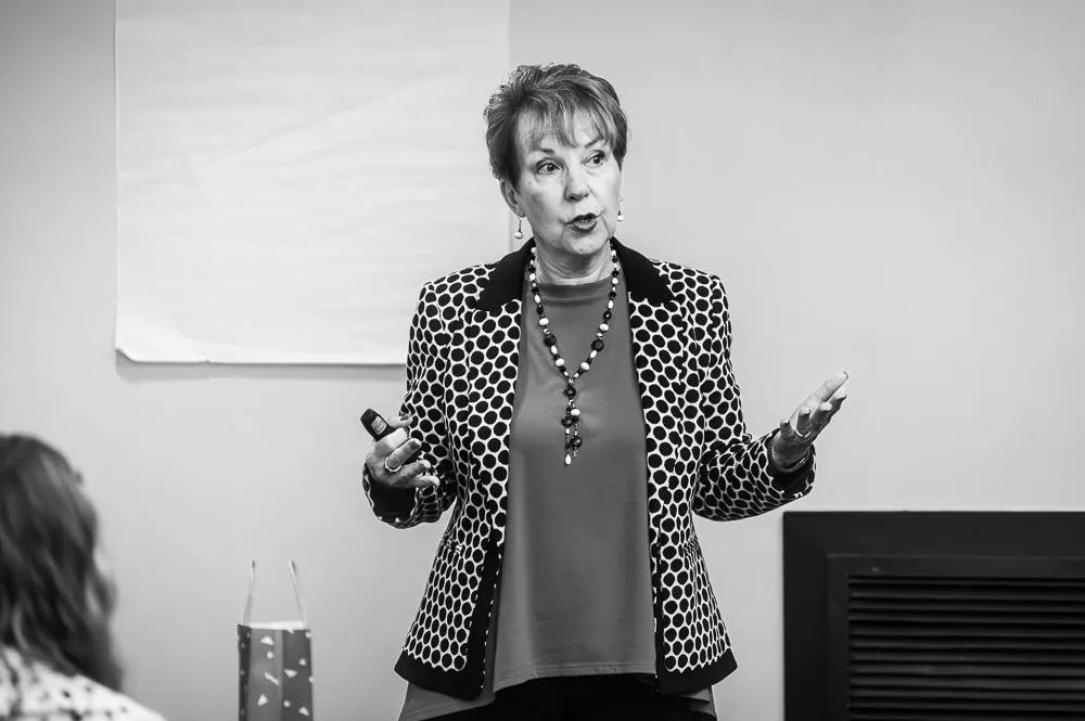 Leslie Speaking to A Group