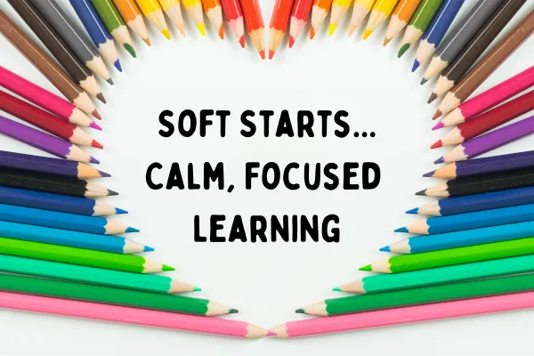 colored pencils forming a heart with the phrase, "soft starts...calm, focused learning" written inside the heart